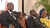 COTE D'IVOIRE - IVORY COAST - Ivorian President Alassane Ouattara (L) and Vice President Tiemoko Meyliet Kone 