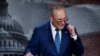 US Senate Majority Leader Chuck Schumer (D-NY) speaks to the media after the 51-50 vote passed the 'Inflation Reduction Act of 2022' on Capitol Hill in Washington, Aug. 7, 2022. 