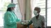 FILE - A doctor checks blood pressure during a general check-up on a patient after he claimed that he had a high temperature and fever in a hospital in Khampaengphet province, 310 km (193 miles) north of Bangkok .