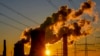 FILE - Steam comes out of chimneys of a coal-fired power station in Niederaussem, Germany, Oct. 24, 2021.