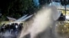 Police use water cannons to disperse protesting students in Colombo, Sri Lanka, July 8, 2022.