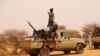 FILE - An anti-aircraft gun is mounted on the back of a pickup truck as Tuareg militants gather in the desert outside Menaka, Mali, March 14, 2020. Tuareg rebels say they killed at least 84 Russian Wagner mercenaries and 47 Malian soldiers in late July 2024.