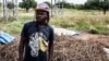 Burkina Faso rapper Art Melody is seen in an undated photo from his Instagram. The caption on it reads: Farmer by day, rapper by night.