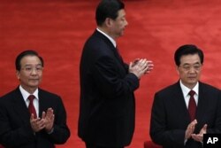 2012年5月4日胡锦涛、温家宝（左）和习近平（中）在庆祝中国共青团成立90周年大会上。