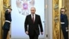 Ruski predsjednik Vladimir Putin ulazi u svečanu salu tokom njegove inauguracije za novi mandat predsjednika, na fotografiji ruske državne agencije Sputnjik, u Kremlju, Moskva, 7. maja 2024.