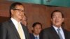 FILE PHOTO - Cambodian Prime Minister Hun Sen, right, talks with the main Opposition Party leader Sam Rainsy, left, of Cambodia National Rescue Party, after their meeting in Senate headquarters in Phnom Penh, Cambodia, Tuesday, July 22, 2012.