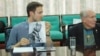 Adam Makos and Thomas Hudner meeting with North Korean army officers (Steve Herman/VOA)