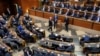 A Lebanese lawmaker, center, casts his vote to elect a new president, at the parliament building in downtown Beirut, Jan. 9, 2025. 