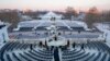 FILE - Members of the U.S. military are on stage during a rehearsal at the U.S. Capitol ahead of President-elect Donald Trump's upcoming inauguration in Washington, Jan. 12, 2025.