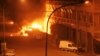 A view shows vehicles on fire outside Splendid Hotel in Ouagadougou, Burkina Faso in this still image taken from a video, Jan. 15, 2016, during a siege by Islamist gunmen. 