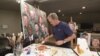 President George W. Bush is seen working on a "Portraits of Courage" painting. (Photo by Grant Miller)