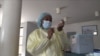 FILE: Osebenza eWilkins Hospital ulungisa ijekiseni yeSinopharm, March 11, 2021. (Columbus Mavhunga/VOA)