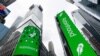 Electronic screens in New York's Times Square announce the Robinhood IPO, Thursday, July 29, 2021. Robinhood has already changed how people trade stocks and who's doing it. Now its sights are on the rest of the financial industry. (AP Photo/Mark…