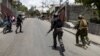 Haitian and Kenyan police patrol a neighborhood in Port-au-Prince, Haiti, on June 28, 2024.