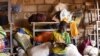 FILE - A displaced boy, who fled with others from his village in northern Burkina Faso following attacks by assailants, is pictured at a school on the outskirts of Ouagadougou, Burkina Faso, June 15, 2019.