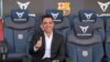 Newly-appointed FC Barcelona's Spanish coach Xavi Hernandez poses for pictures during his presentation ceremony at the Camp Nou stadium in Barcelona on November 8, 2021. (Photo by LLUIS GENE / AFP)
