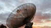 A radio telescope at the Parkes Observatory is pictured at sunset near the town of Parkes, Australia, July 15, 2019. 
