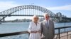 Britain's King Charles III, right, and Queen Camilla pose for pictures in front of the Sydney Harbour Bridge on Oct. 22, 2024 in Sydney, Australia. 
