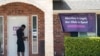 A security guard opens the door to the Whole Women's Health Clinic in Fort Worth, Texas, Sept. 1, 2021.