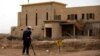 A sapper belonging to the HALO Trust, an international landmine clearance charity, looks for old mines in an abandoned church property complex near Qasr Al-Yahud, a traditional baptism site along the Jordan River, near Jericho in the occupied West Bank, M