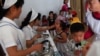 북한 평양의 탁아소에서 유엔아동기금(UNICEF·유니세프)이 지원한 비타민과 구충제를 지급하고 있다. (자료사진)