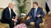 FILE -Nobel Peace Prize winner and one of the leaders of the National Salvation Front, Mohamed ElBaradei (L), meets with Egyptian President Mohammed Morsi, in Cairo, Egypt, November 2012.