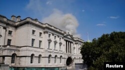 Smoke rises due to a fire at Somerset House in London on Aug. 17, 2024.