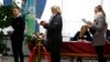 People queue to cast their vote at a polling station during the parliamentary election in Minsk, Belarus, Nov. 17, 2019.