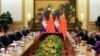 Cambodian King Norodom Sihamoni, second right, and Chinese President Xi Jinping, left, attend a meeting at the Great Hall of the People in Beijing, Tuesday, May 14, 2019. (Jason Lee/Pool Photo via AP)