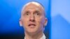 FILE - Carter Page, a former foreign policy adviser of Donald Trump, speaks at a news conference at RIA Novosti news agency in Moscow, Dec. 12, 2016. The FBI reportedly obtained a Foreign Intelligence Surveillance Court warrant for Page as part of an investigation into alleged links between Russia and the Trump campaign.
