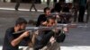 Shi'ite volunteers from Tal Afar, Iraq take part in a military training to fight against militants of the Islamic State in Kerbala Sept. 27, 2014. 