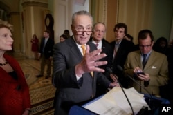 Senate Democratic Minority Leader Charles Schumer speaks with reporters on Capitol Hill in Washington, March 28, 2017. Schumer warned Republicans Friday against changing voting rules that would reuqire just a simple majority.
