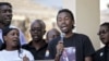 Members of Uganda's gay community lead a choir during a memorial service for David Kato, one of the country's most visible gay campaigners, on his first death anniversary in Kampala, January 26, 2012. 