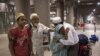 An Indian evacuee from Yemen hugs her son after arriving at the international airport in Mumbai, April 6, 2015.