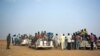FILE - Nigeriens and third-country migrants head towards Libya from Agadez, Niger on Monday, June 4, 2018. 