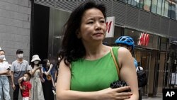 Cheng Lei, a Chinese-born Australian journalist for CGTN, the English-language channel of China Central Television, attends a public event in Beijing on Aug. 12, 2020. 