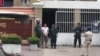 Kung Raiya, standing in front of the Phnom Penh Municipal Court, was arrested this week after attempting to sell t-shirts on Facebook with images of slain political commentator Kem Ley, Phnom Penh, Cambodia, July 10, 2019. 