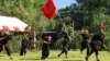 Cambodian students from Royal University of Fine Arts reenact torture and execution by the Khmer Rouge during their reign of terror in the 1970s in an event hosted by the ruling Cambodian People's Party to mark the annual Day of Anger at Choeung Ek, outside Phnom Penh, Cambodia.
