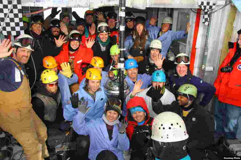 Members of the IceCube Collaboration before the deployment of the last digital optical module (DOM), installed on Dec. 18, 2010. (Robert Schwarz, NSF)