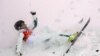 FILE - Lydia Lassila of Australia competes in the 2018 Winter Olympics in South Korea. Coronavirus fears are prompting police in Australia to put up roadblocks to one of the country's most popular ski areas.