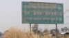 Signage of Chinese-owned sugarcane Rui Feng company can be seen along the national road in Chhaeb district, Preah Vihear province, Saturday, February 1, 2020. (Sun Narin/VOA Khmer) 