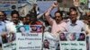 Activists call for protection of Hindu girls at a protest in Hyderabad, Pakistan, March 26, 2019. A court in Islamabad has ordered protection for two sisters from the minority Hindu community as investigators work to determine whether the two were abducted and forced to convert.