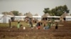 FILE - In this photo taken Oct. 24, 2017, South Sudanese refugees are seen at the Nguenyyiel refugee camp during a visit by U.S. Ambassador to the United Nations Nikki Haley to Gambella region, Ethiopia.
