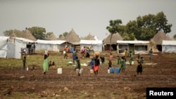 FILE - In this photo taken Oct. 24, 2017, South Sudanese refugees are seen at the Nguenyyiel refugee camp during a visit by U.S. Ambassador to the United Nations Nikki Haley to Gambella region, Ethiopia.
