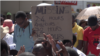 Zimbabwe’s doctors and nurses protest the disappearance of Peter Gabriel Magombeyi, acting president of the Zimbabwe Hospital Doctors Association, in Harare, Sept. 19, 2019. (C. Mavhunga/VOA)