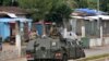 Des éléments des forces armées de Guinée traversent le quartier de Kaloum à Conakry, le 5 septembre 2021.