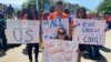 Protesters in front of US Supreme Court in Washington D.C. as justices hear arguments about citizenship question that Trump administration wants to add to questionaire, April 23, 2019. 