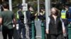 Police patrol a street in Melbourne, Australia, on Sept. 6, 2020, as the state announced an extension to its strict lockdown law while it battles fresh outbreaks of the COVID-19 coronavirus.