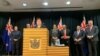 FILE - New Zealand's Foreign Minister Nanaia Mahuta, with senior lawmakers looking on, talks to reporters, in Wellington, New Zealand, Nov. 2, 2020.