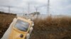 A radiation monitor indicates 102.00 microsieverts per hour at the crippled Fukushima Dai-ichi nuclear power plant in northeastern Japan, Feb. 20, 2012. 
